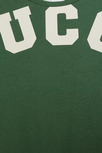 تي شيرت بشعار الماركة قطن