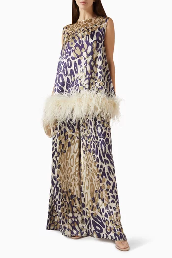 بلوزة مزينة بنقشة وريش