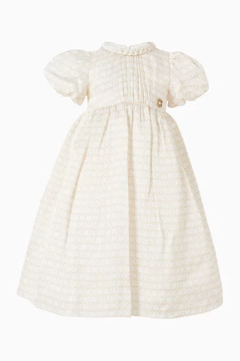 فستان وسروال تحتي بشعار الماركة