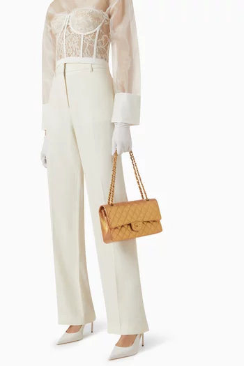 حقيبة متوسطة بغطاء قلاب جلد مبطن غير مستعملة