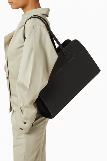 حقيبة يد جلد صناعي بشعار الماركة