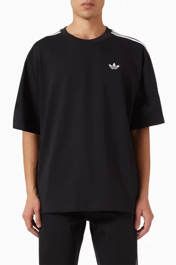 تي شيرت فضفاض بثلاثة خطوط قطن