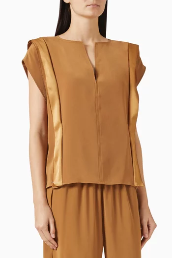 بلوزة بأشرطة جانبية