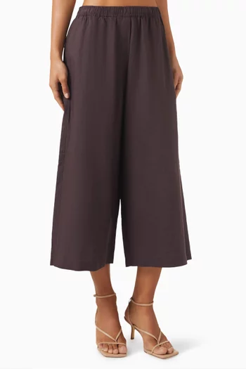 بنطال بنمط تنورة كتان بقصة ساق واسعة