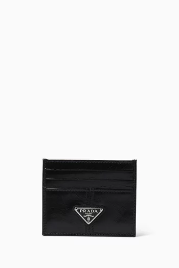 حافظة بطاقات بشعار الماركة جلد