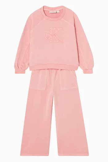 بنطال رياضي بقصة ساقين واسعتين وشعار الماركة