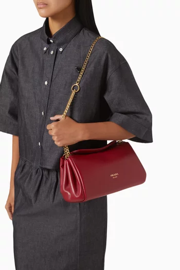 حقيبة تومولت برادا صغيرة جلد نابا