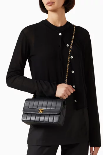 حقيبة مادموزيل بغطاء قلاب جلد مبطّن