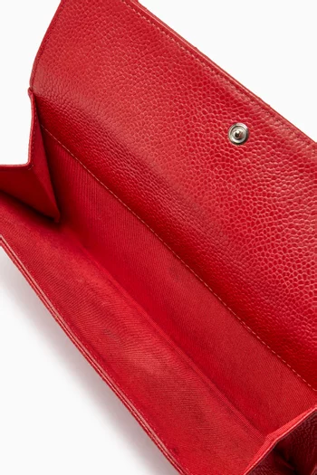 محفظة كونتينينتال بغطاء قلاب جلد كافيار مبطن