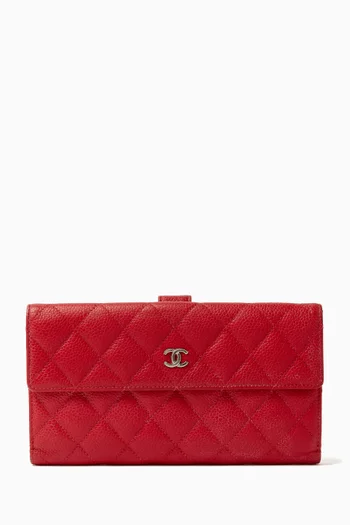 محفظة كونتينينتال بغطاء قلاب جلد كافيار مبطن