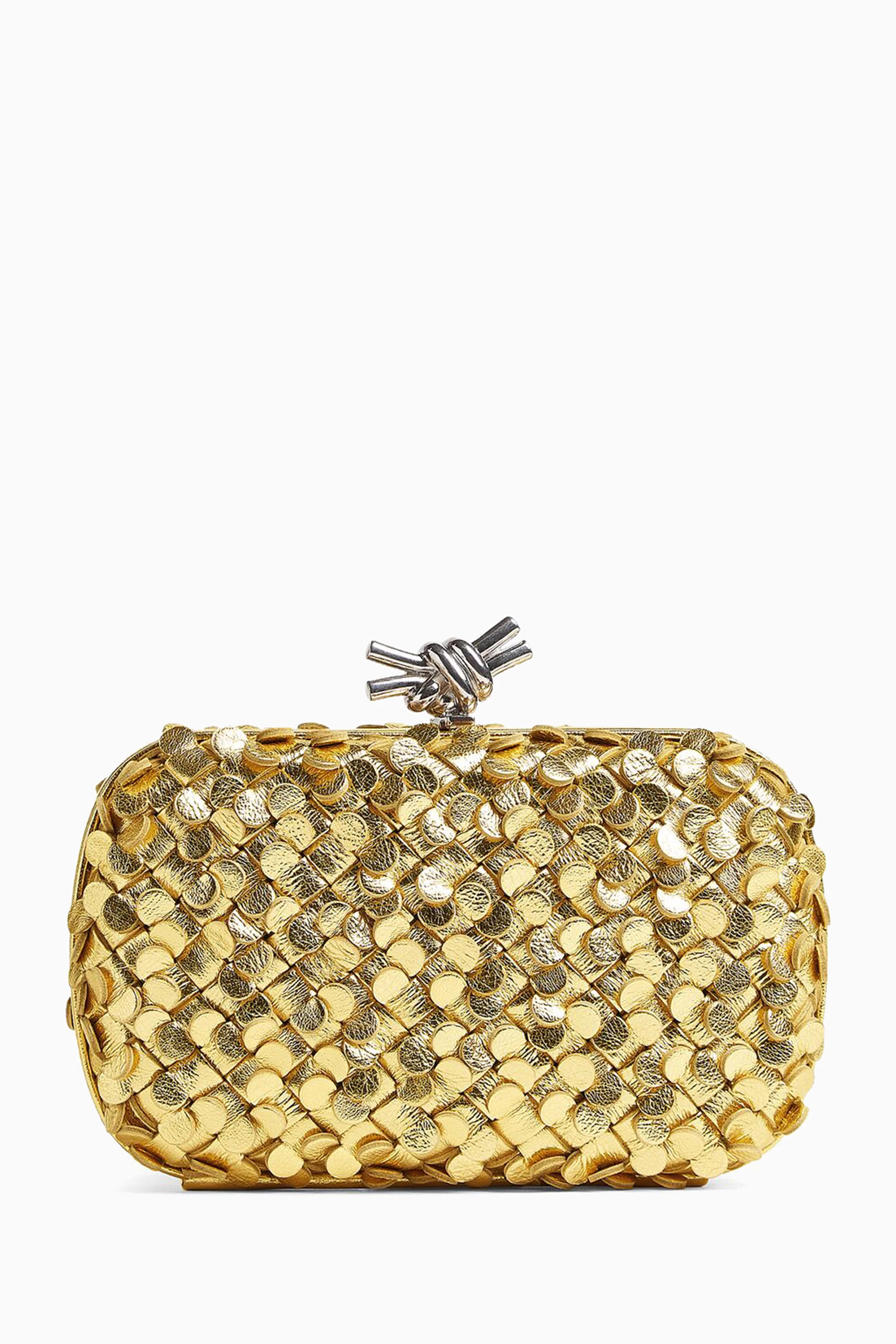 Knot clutch top